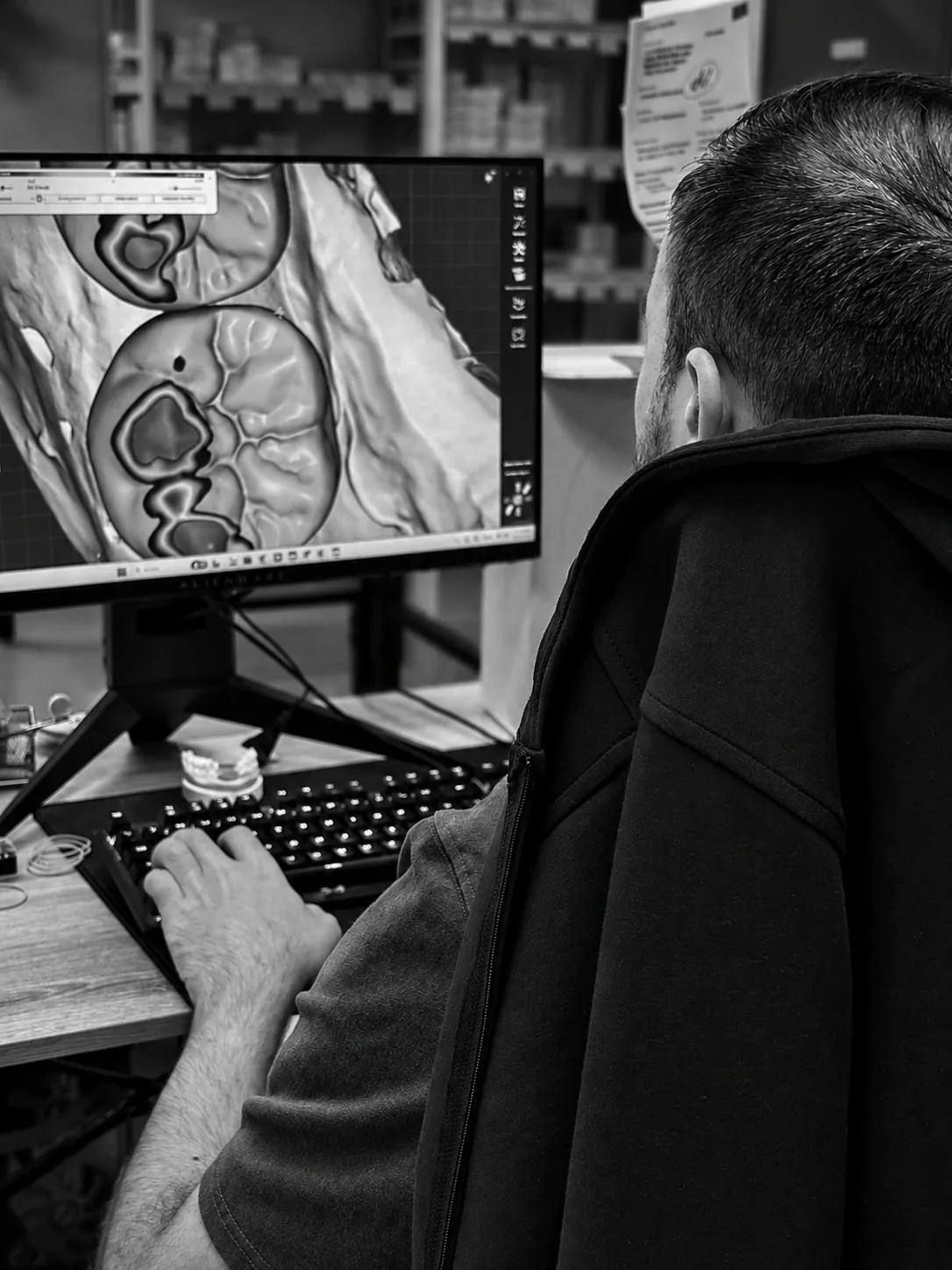 A technician designing a restoration digitally